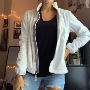 White north face zip up jacket